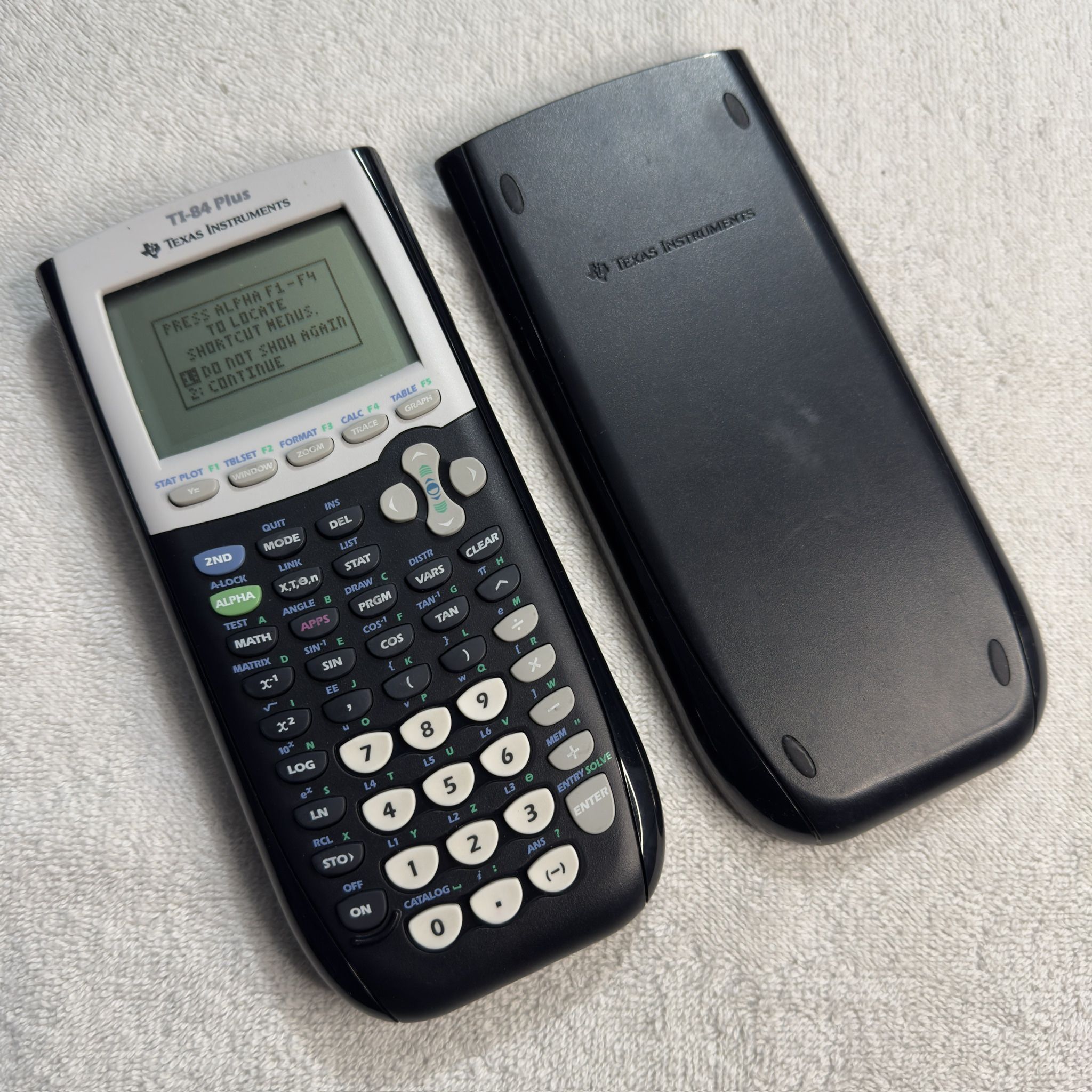 Texas Instruments Calculator TI-84 Plus Graphing Calculator Black with Batteries 