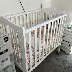 Mini Crib With Brand New Mattress And Bedding 