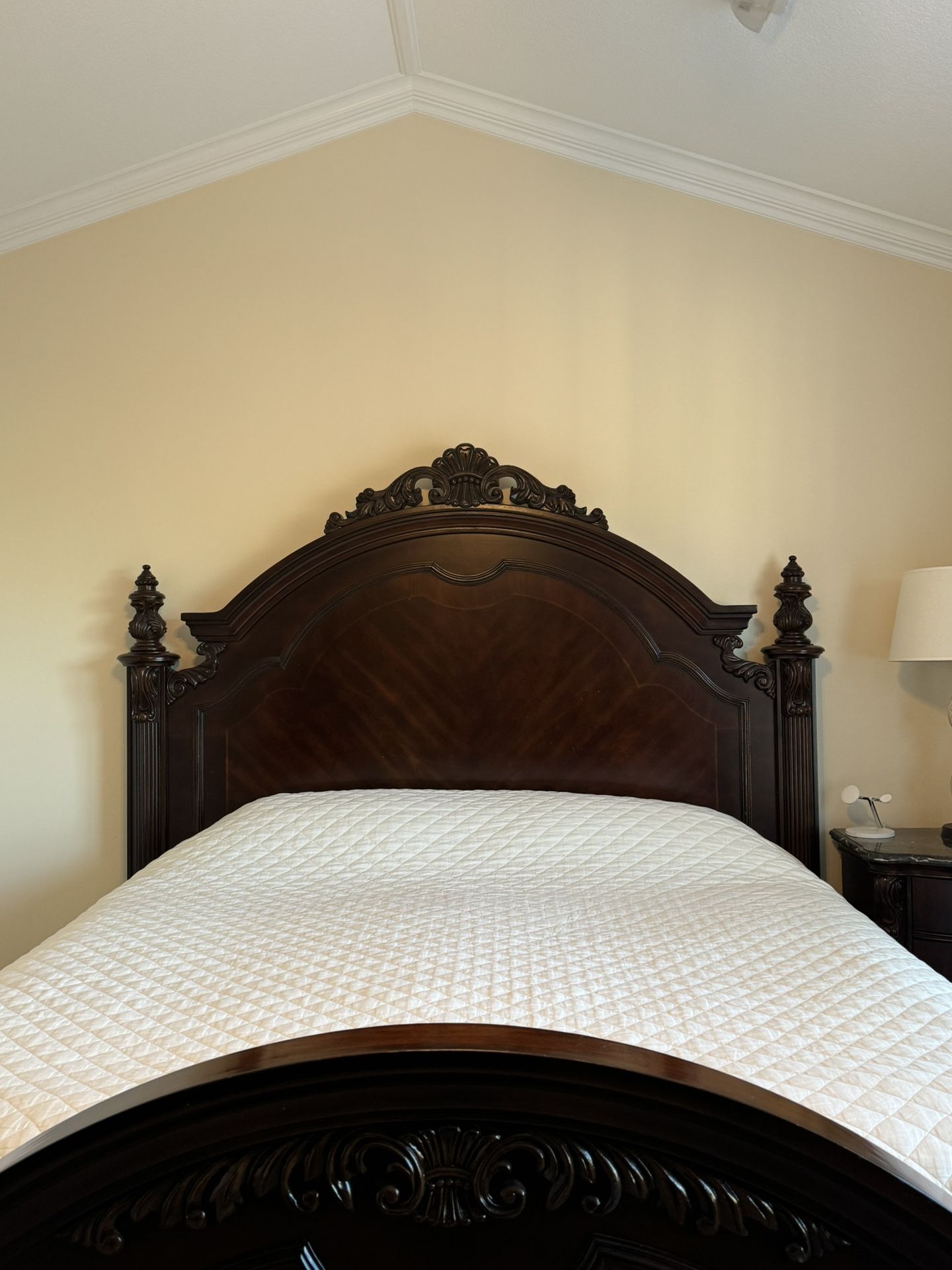 Brown wooden king size bed