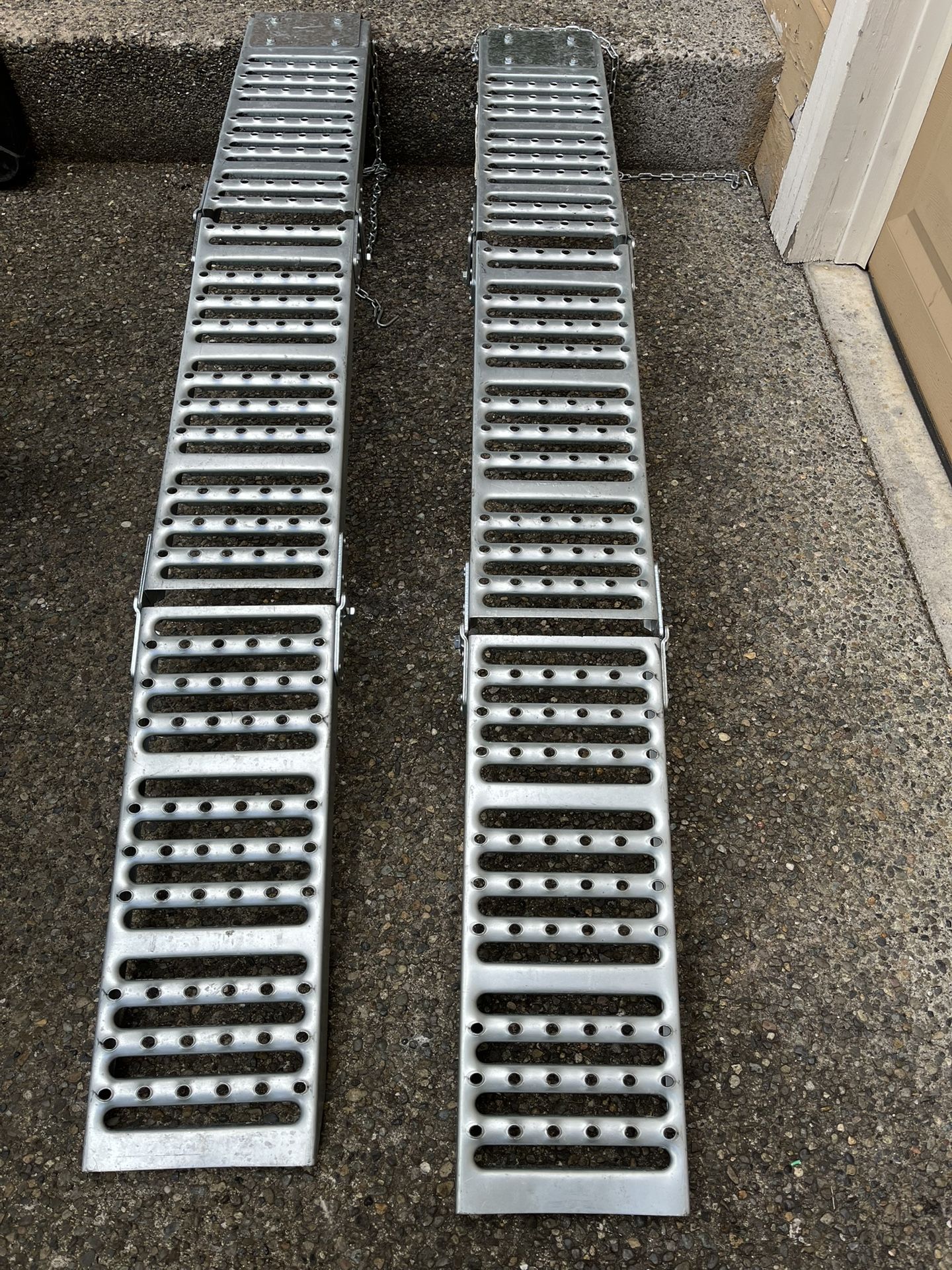 Trifold, steel loading ramps.