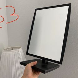 Large black tabletop mirror