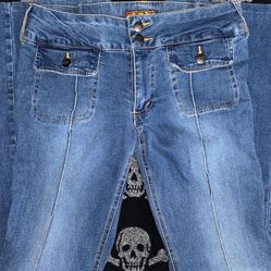 Blue low rise flared jeans (Size: 11)