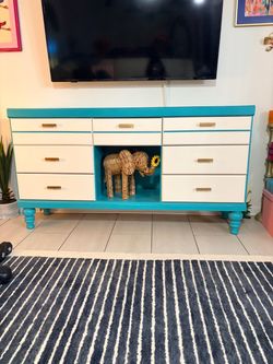 Teal and cream tv console