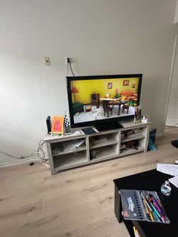 Dusty Gray Oak TV Stand for TVs up to 75” – $50