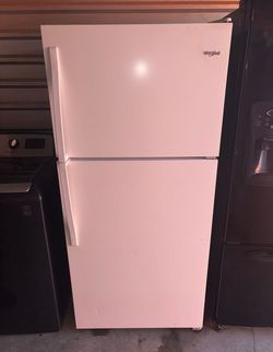 White Whirlpool Refrigerator And Freezer