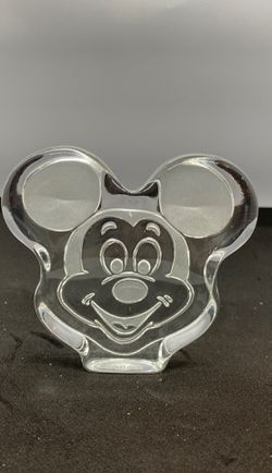 Mickey Mouse paperweight. There is a tiny chip in the glass, visible in the photos. $25