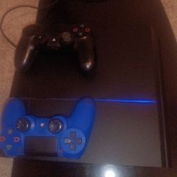 PS4, 2 Controllers, And 14 Game Discs.