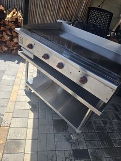 48 inch Griddle and table on casters $1200