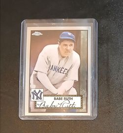 Babe Ruth card in a hard protective case.  $10
