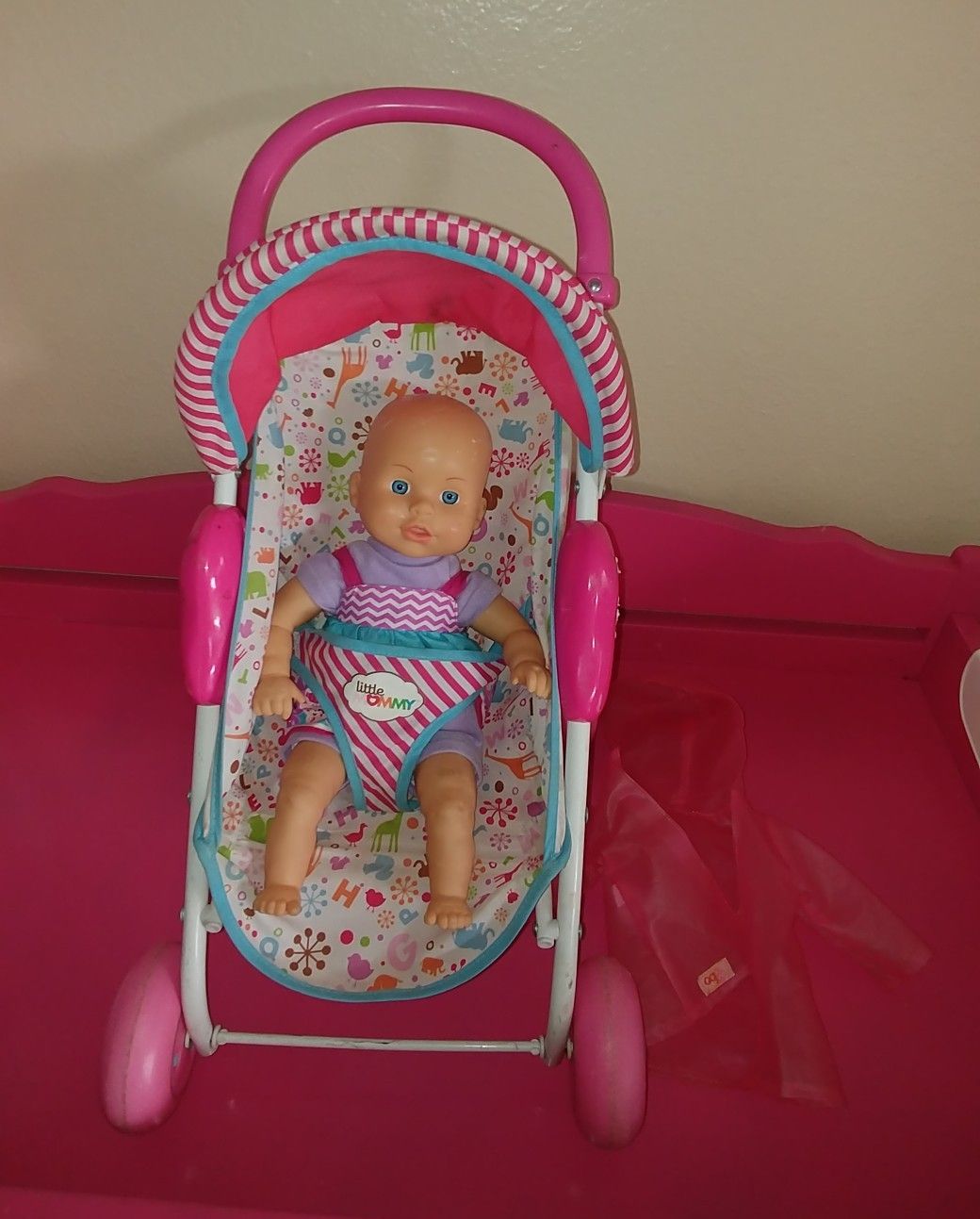 Baby doll and doll stroller