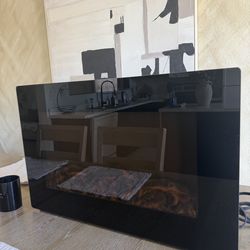 Electric fire place32”  (needs bulbs)