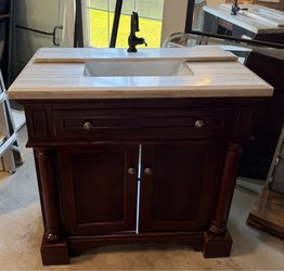 Beautiful Wood Bathroom Vanity with Stone Top & Kohler Fauce