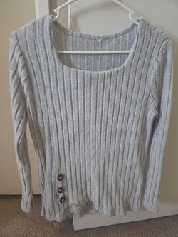 Gray Ribbed Long Sleeve Top Size Small and could fit a medium  person.