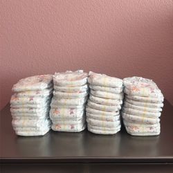 Unused Baby Diapers – 49 Count - Huggies plus Little Snugglers Size 1 