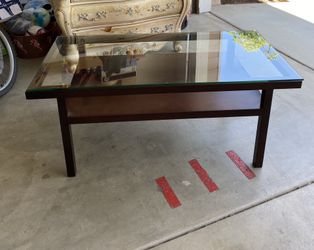 Glass table with metal legs