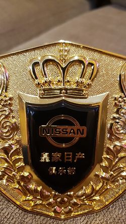 Nissan grill emblem