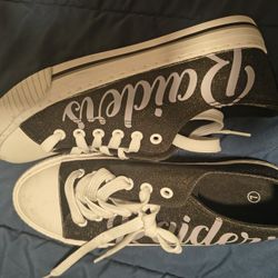 WOMAN RAIDERS SHOES SIZE 7