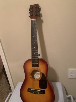 A miniature guitar for sale