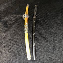 Two decorative swords