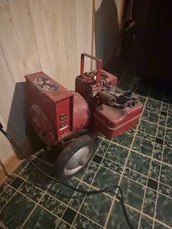 Vintage Red Gas-Powered Generator Briggs and Stratton