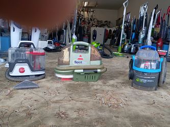 Portable handheld upholstery cleaners and spot bot