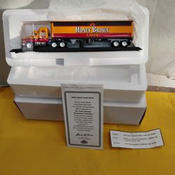 Honey brown lager Mack truck collectible with certificate