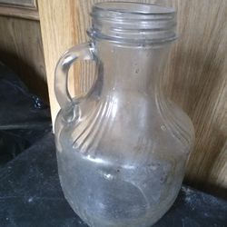 A  Antique And Vintage Unique Glass Clear Jar with Handle