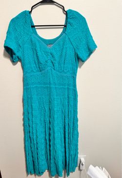 Blue dress. Knee length