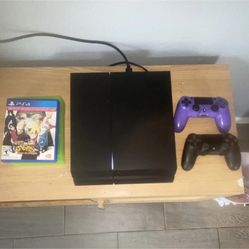Play Station 4 Slim with Cords, 2 Controllers, 4 games. 