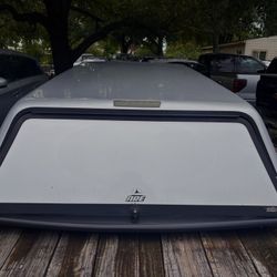 A.R.E. fiberglass Cab-high Camper Truck Shell