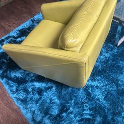 Green leather arm chairs