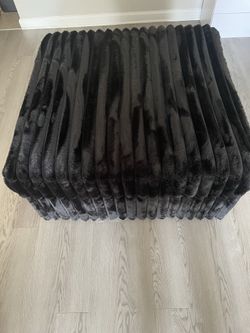Ashley’s midnight madness oversized ottoman