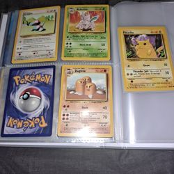 1995 pokemon cards Pikachu,Gastly,porygon,Dugtrio,Nidorino,Onix,Abra, and Ratta