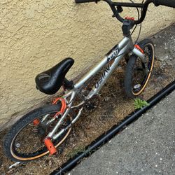 Small Orange Silver Bike.