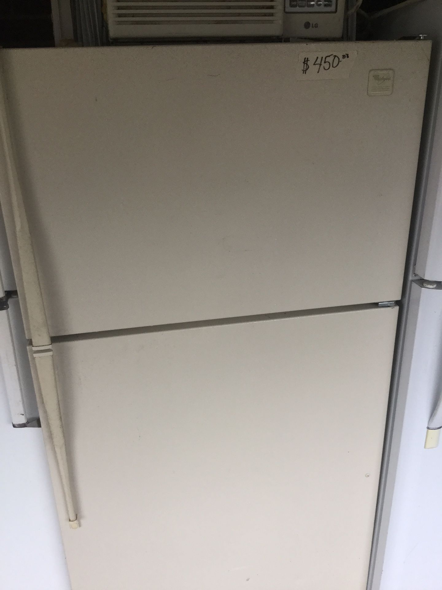 Whirlpool 33 inch wide refrigerator/ one year warranty/ delivery and installation are available