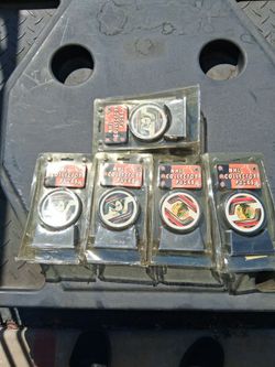 5 new hockey pucks.