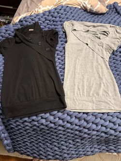 Soft knit short sleeve tops with diagonal button detail. Lightweight fabric for easy layering.