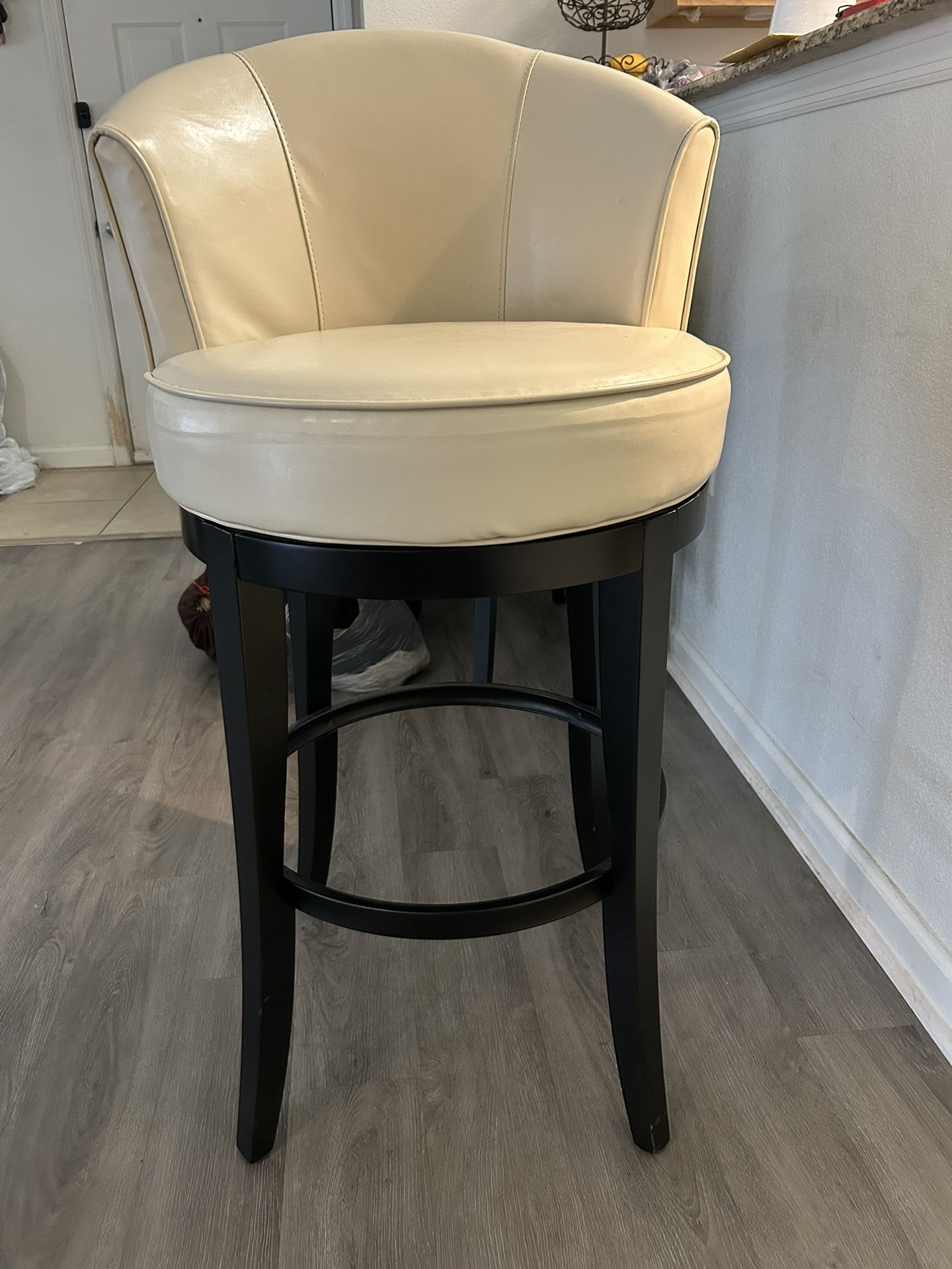 3 Beige Swivel Stools