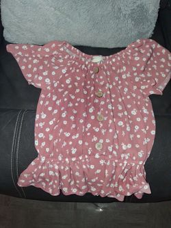 Kids shirt for girls a pink shirt with flowers in it the size is 7/8