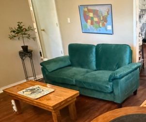 Vintage green velvet couch