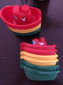 Toy boats (red, yellow & green) 12 for $9