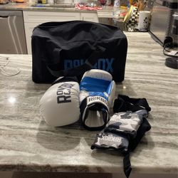 Boxing Gloves, Grips And Duffle Bag