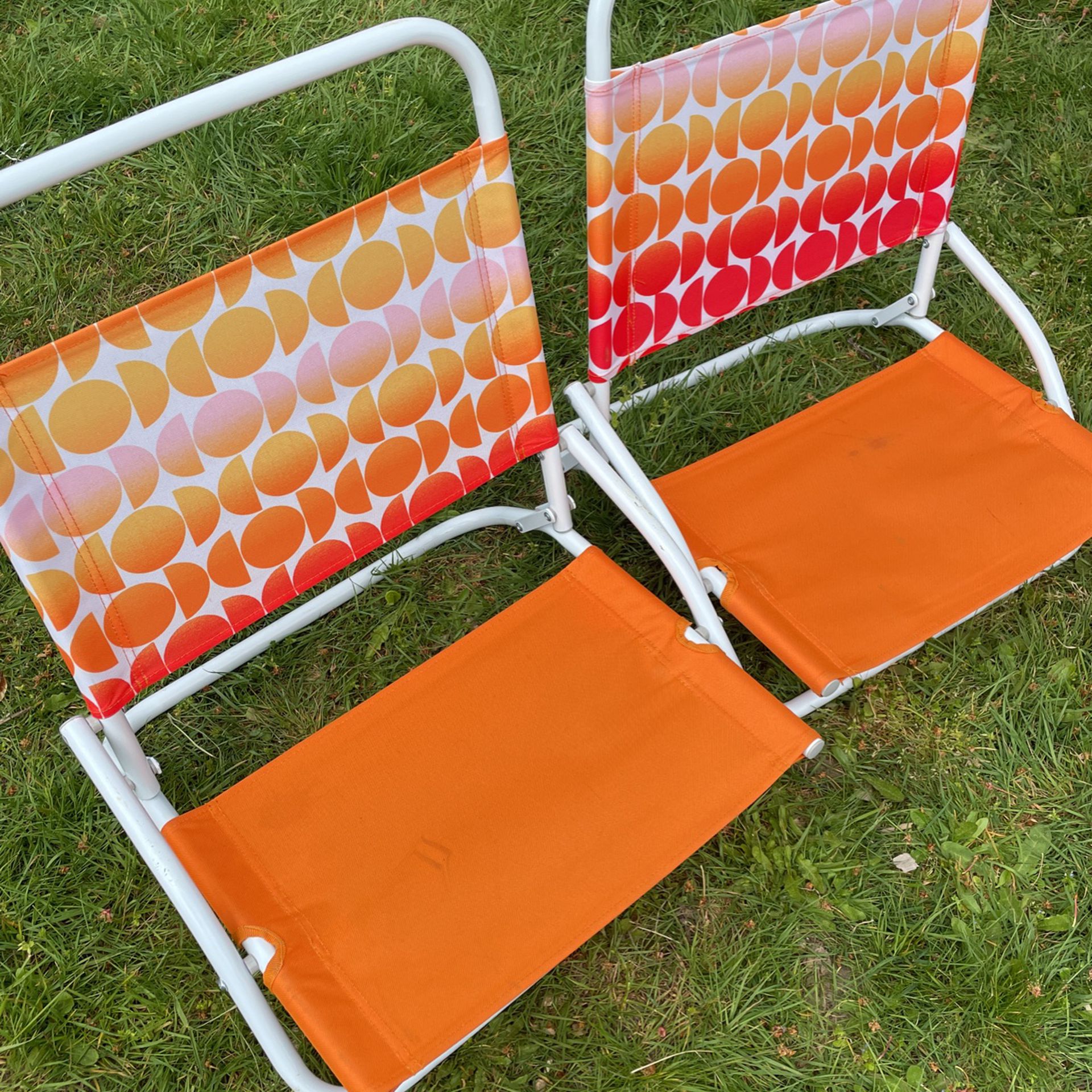 Two Low Profile Folding Chairs