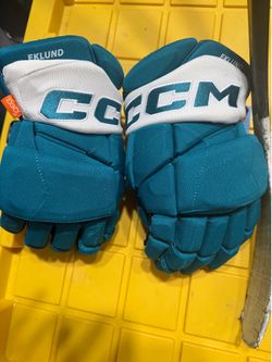 William Eklund used gloves and signed stick