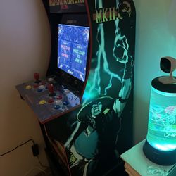 I'm selling my perfect condition Arcade Mortal Kombat with raiser. Estoy vendiendo mi Arcade Mortal