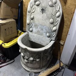 Water fountain, concrete base in concrete top can be turned into a solar water fountain with Koi fish