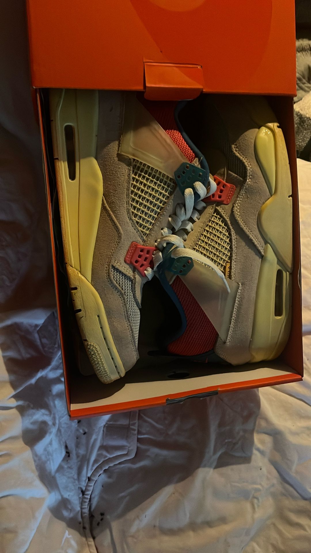 Jordan 4 Retro Union Guava Ice