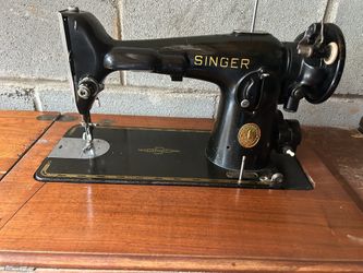 Vintage 1948 Singer Sewing Machine with cabinet
