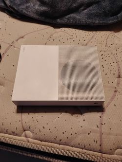 Xbox One s with controller and cords