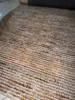 2 rugs 10x7